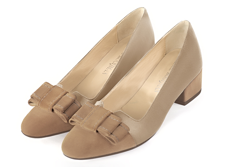 French elegance and refinement for these tan beige dress pumps, with a knot on the front, 
                available in many subtle leather and colour combinations. Possibility to customize with your colors, materials and heels.
With its original cutout, this pretty fitted pump
will render you great services, combining comfort and distinction. 
                Matching clutches for parties, ceremonies and weddings.   
                You can customize these shoes to perfectly match your tastes or needs, and have a unique model.  
                Choice of leathers, colours, knots and heels. 
                Wide range of materials and shades carefully chosen.  
                Rich collection of flat, low, mid and high heels.  
                Small and large shoe sizes